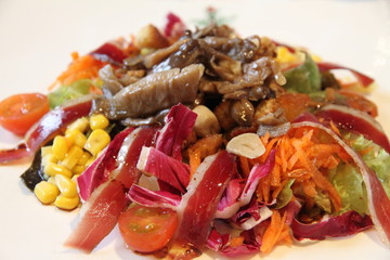 Salad with duck ham