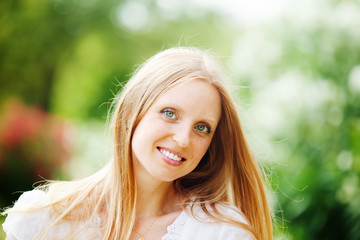 Smiling beautiful blonde middle-aged woman