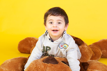 little boy on yellow background