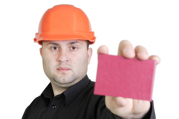 Builder in helmet isolated on white background