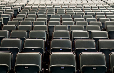 Empty rows of chairs, seats in the concert hall,