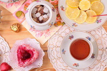 Warm cup of tea and sweets