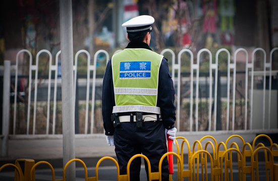 Traffic police officer on the street in Beijing, China