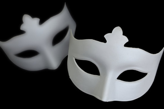 White mask on black background