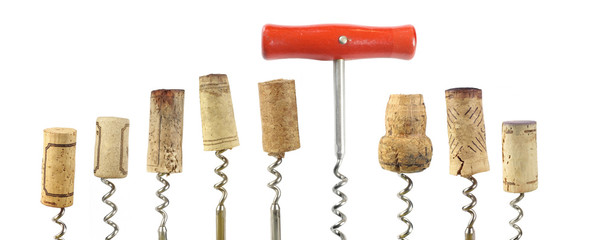 collection of wine corks and corkscrew, isolated on white backgr