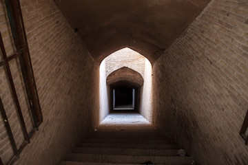 Entrance to an a underground aqueduct in Yazd, Iran