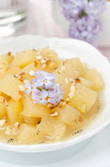 closeup of compote of apples and pears with vanilla