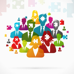 Fototapeta premium People working as a team to solve the puzzle