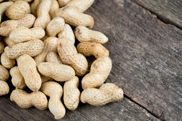 peanuts on an old wooden surface