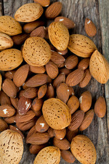 almonds on wooden surface