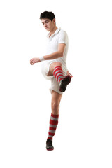 Young football player score goals with raised foot on white back