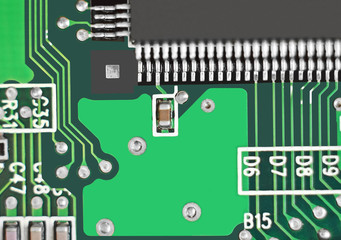 Close up of a printed green computer circuit board