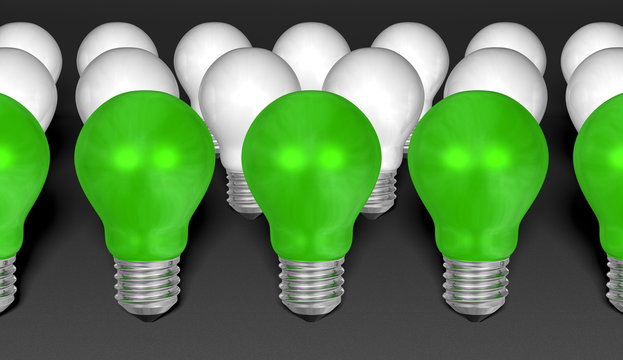 Rows of green and white light bulbs on grey background