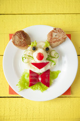 children's meal  on wooden boards