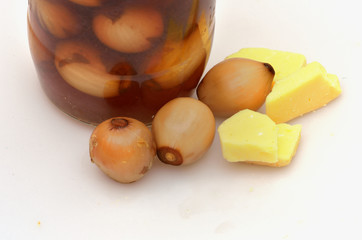 pickled onion jar and cheese in close up