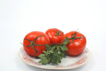Tomatoes with parsley on the side plate