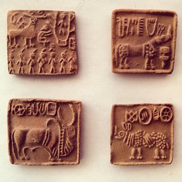 Ancient civilization drawings on clay bricks