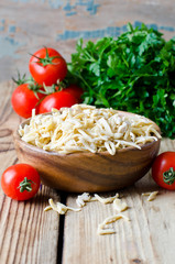 Raw, homemade pasta and vegetables