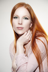 Beautiful woman with red hair