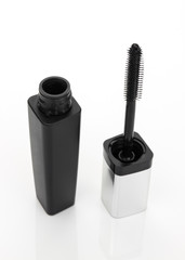 Black mascara on white background