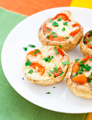 Mushrooms stuffed with mozzarella and tomato