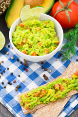 Guacamole with avocado, lime, tomato