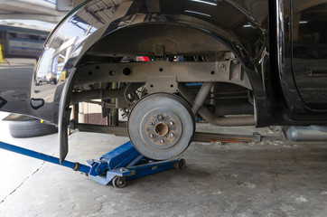Rear drum brake assembly on car