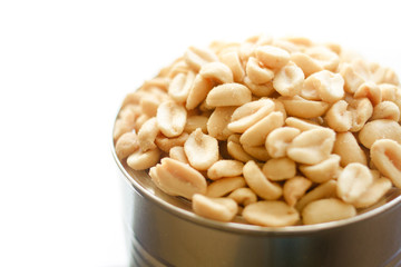 salted peanuts, nuts in a small metal bowl - isolated