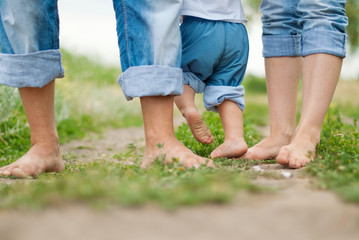 Happy family on a walk in summer