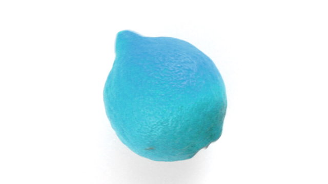 Lemon changing colors,  rotating,  upper view