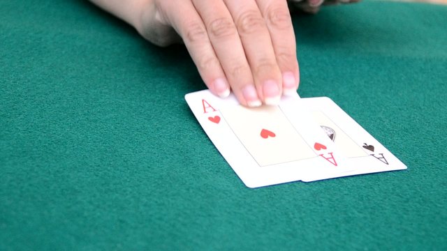 Girl showing poker cards