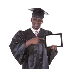 Graduation Man Showing Tablet Pc