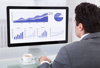 Businessman Analyzing Graph
