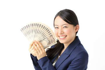 お金を持って喜ぶ女性