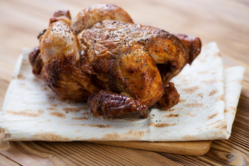 Smoked spicy chicken on pita bread, horizontal shot