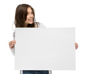 Fototapeta premium Half-length portrait of smiley girl holding copyspace