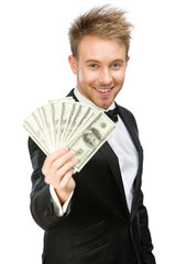 Half-length portrait of businessman handing cash
