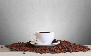 Coffee cup and beans