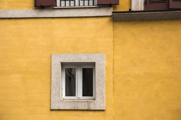 Obraz na płótnie Canvas Window on the wall of building