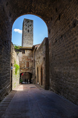 Tower viewed through an arch
