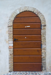 Wooden door. Montefalco. Umbria. Italy.