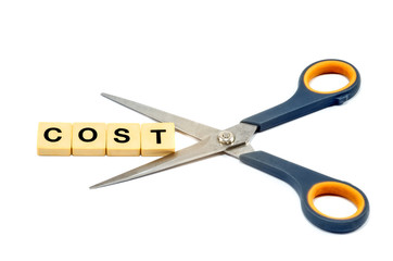 Isolated word Cost Turkish tasarruf being cut by a scissors