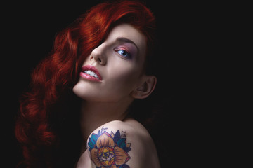 Fototapeta premium Sensual portrait of beautiful girl with tattoo