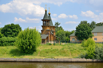 Fototapeta premium cathedral with bell tower on Volga river bank in Russia