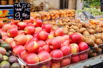 close up of apples on market stand