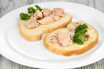 Tasty sandwiches with tuna and cod liver sardines,