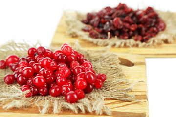 Fresh and dry cranberry, isolated on white