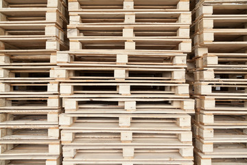 Stack of wooden pallets with selective focus