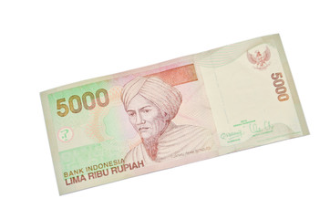 Indonesian Rupiah on a white background.