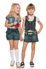 Young girls with red berries